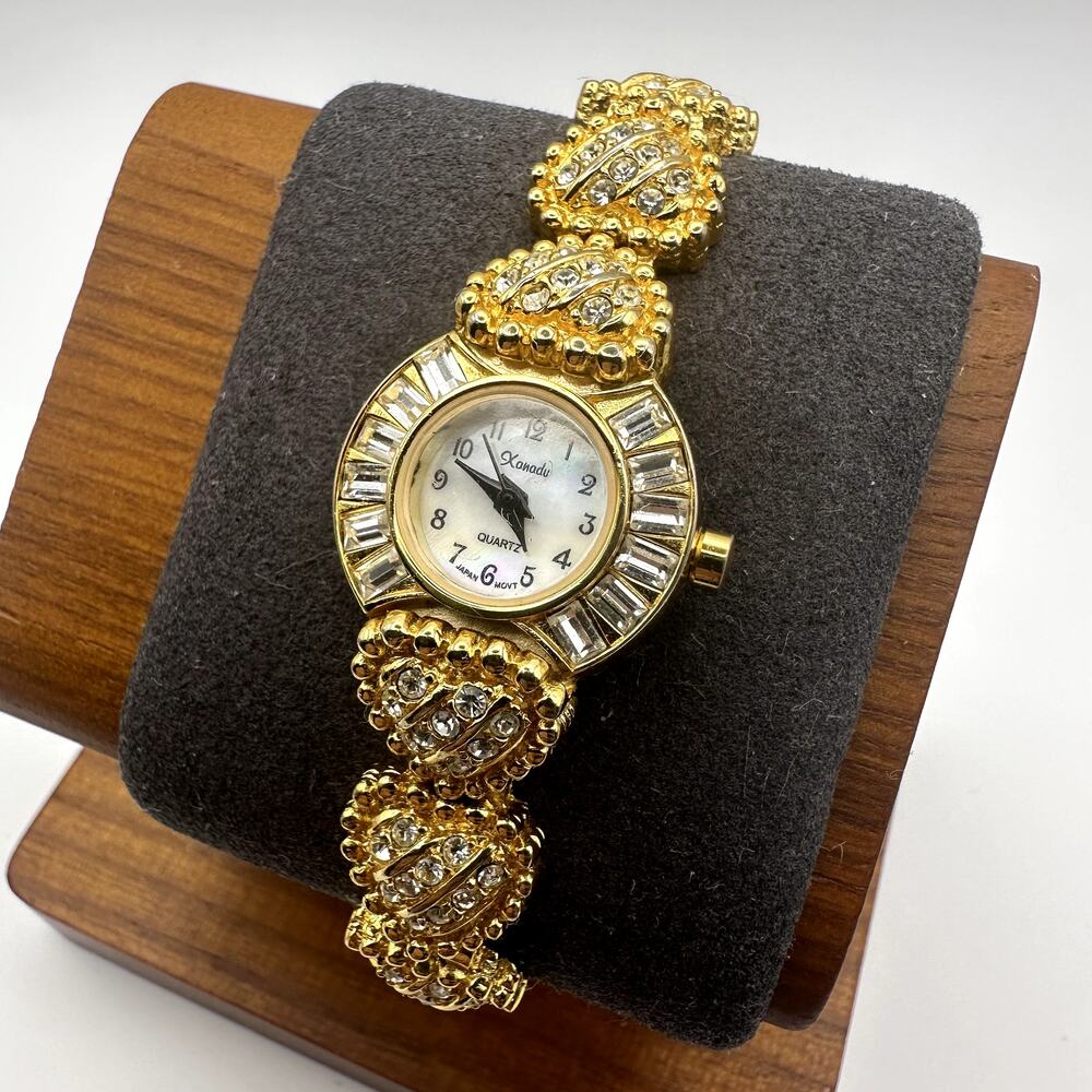 Xanadu Gold Tone Vintage Quartz Bracelet Watch Mother-of-Pearl Dial Shell Links